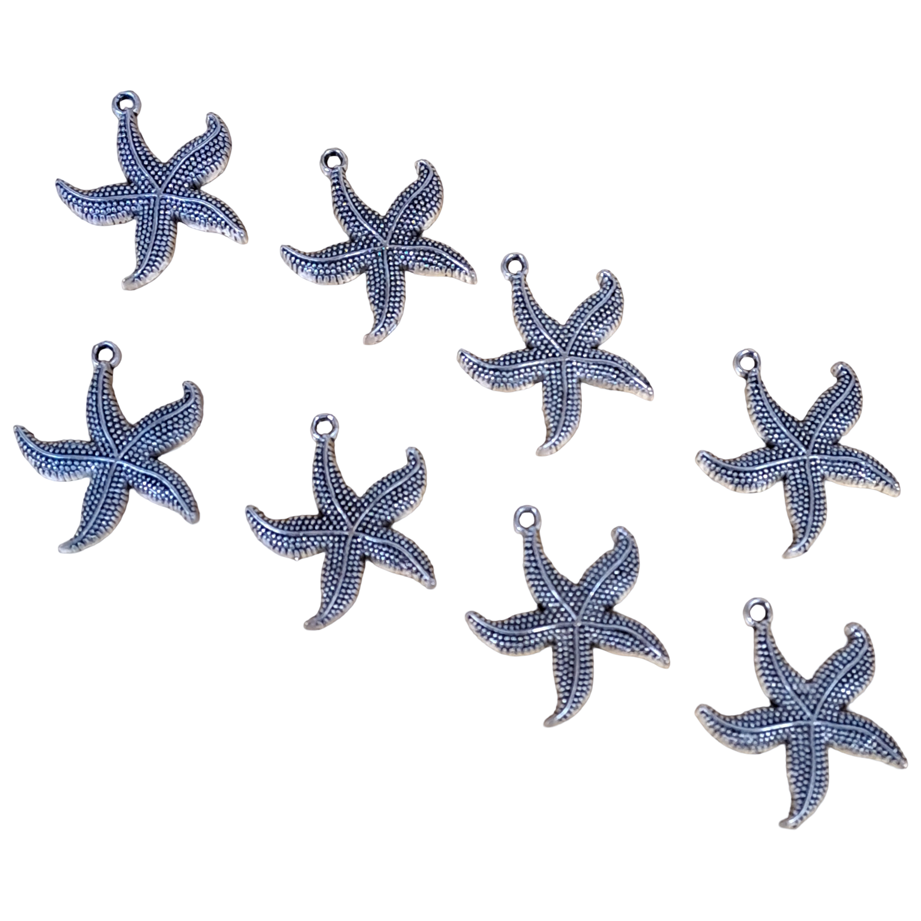 Seestern aus Metall 22 x 27mm / im Altsilber - Look